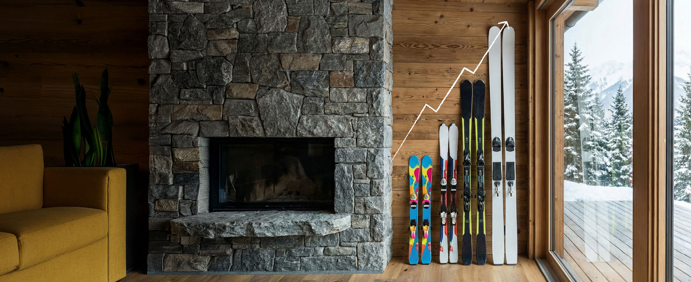 kavč kamin in štiri smuči v leseni zgradbi sredi zasnežene pokrajine